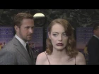 La La Land Gala: Ryan Gosling creeps up on Emma Stone!