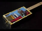 Cigar box guitar with bass pickup dedicated to Charley Patton