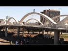 BMX biker rides over Ft. Worth 7th Street Bridge arches