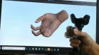 TORC: A virtual reality controller for in-hand high-dexterity finger interaction